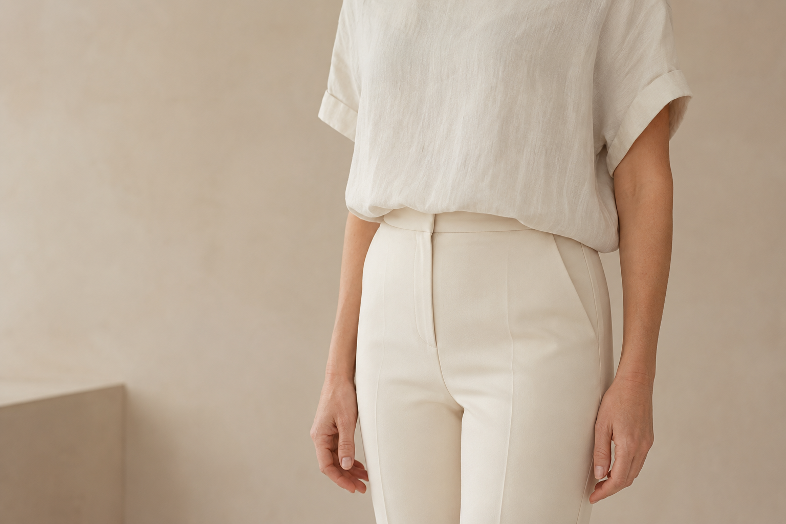 Discreet editorial photograph focusing on the lower abdominal and pubic contour